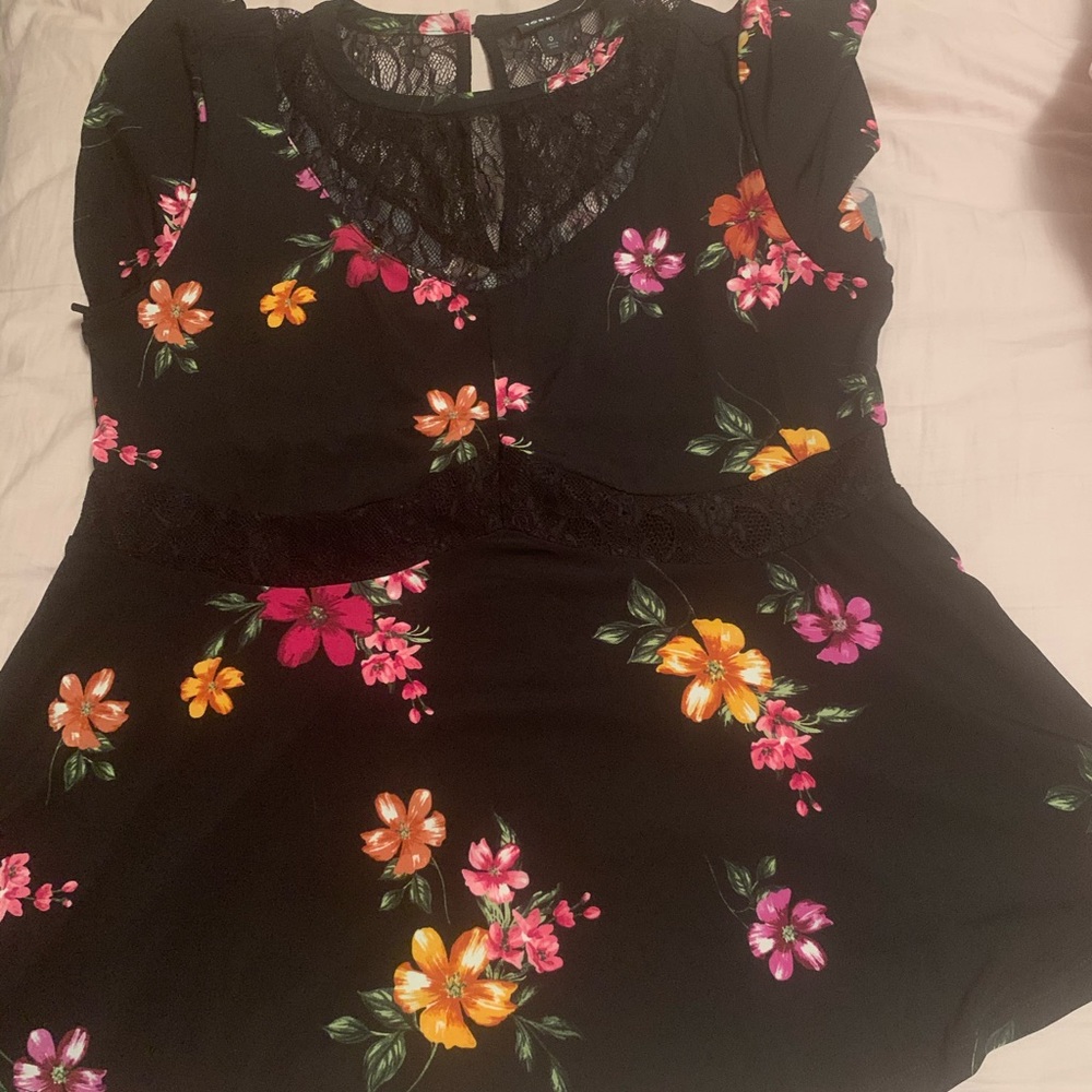 Torrid peplum floral top.